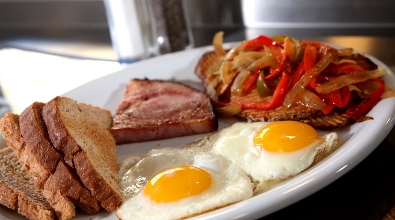 The 416 Special at the 416 Diner in Dayton's Oregon District, has two eggs and a choice of bacon, ham or sausage. The breakfast plates also come with toast and a choice of hash browns or fried potatoes. LISA POWELL / STAFF
