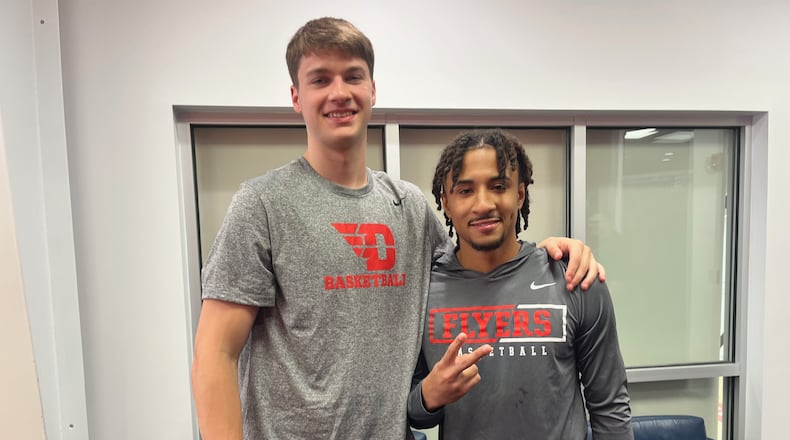 Dayton's Jordan Derkack, left, and Javon Bennett, former teammates at Merrimack, pose for a photo on Thursday, June 5, 2025, at UD's Cronin Center. DAVID JABLONSKI / STAFF