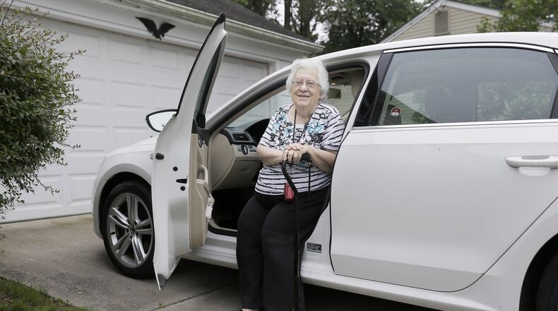 Dolores Munson of Stratford, N.J., gets in her 2012 Volkswagon Passat on June 6. (Elizabeth Robertson/Philadelphia Inquirer/TNS)