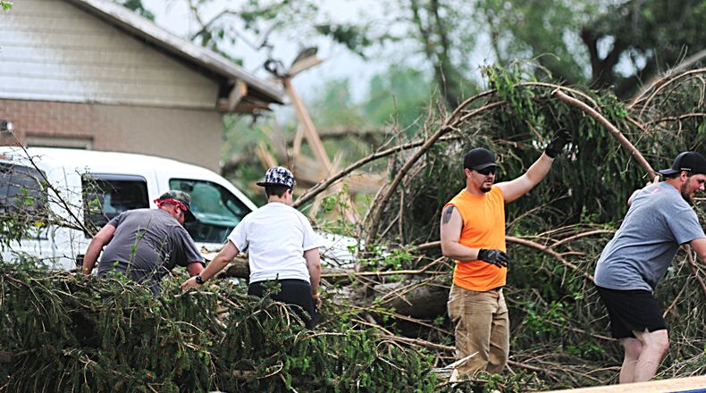 Community members came together to help clean up tornado debris in Miami County's Union Township three years ago.