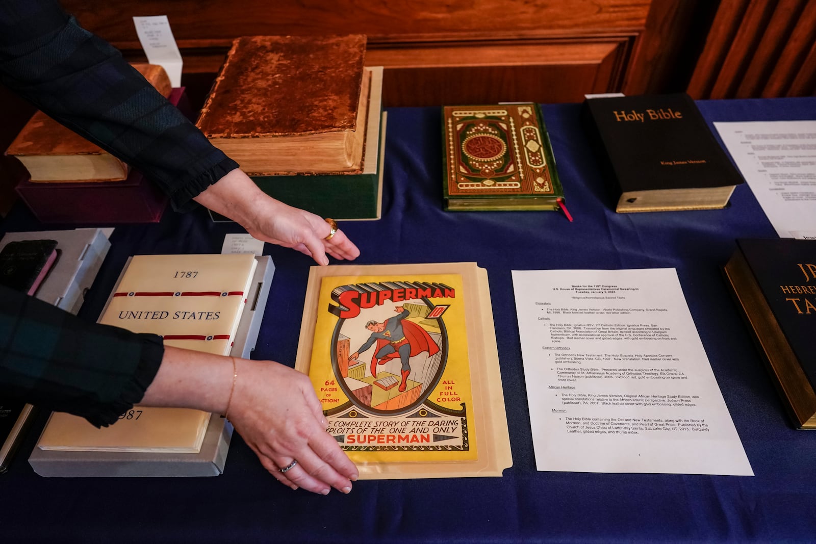 FILE - A first edition Superman comic from 1939 is placed with copies of the Constitution and a variety of holy books for use in the swearing-in ceremonies of new House members, at the Capitol in Washington, Jan. 3, 2023, opening day of the 118th Congress. (AP Photo/J. Scott Applewhite, file)