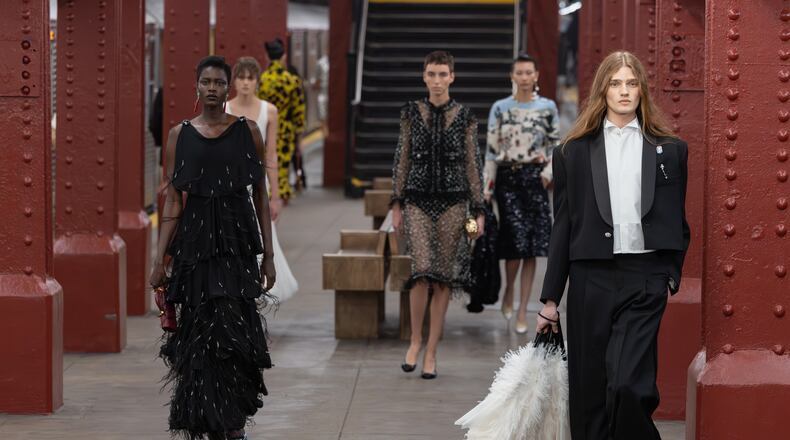 Models walk the runway during the CHANEL 2025/26 Métiers d'art fashion show at Bowery subway station on Tuesday, Dec. 2, 2025, in New York. (Photo by CJ Rivera/Invision/AP)