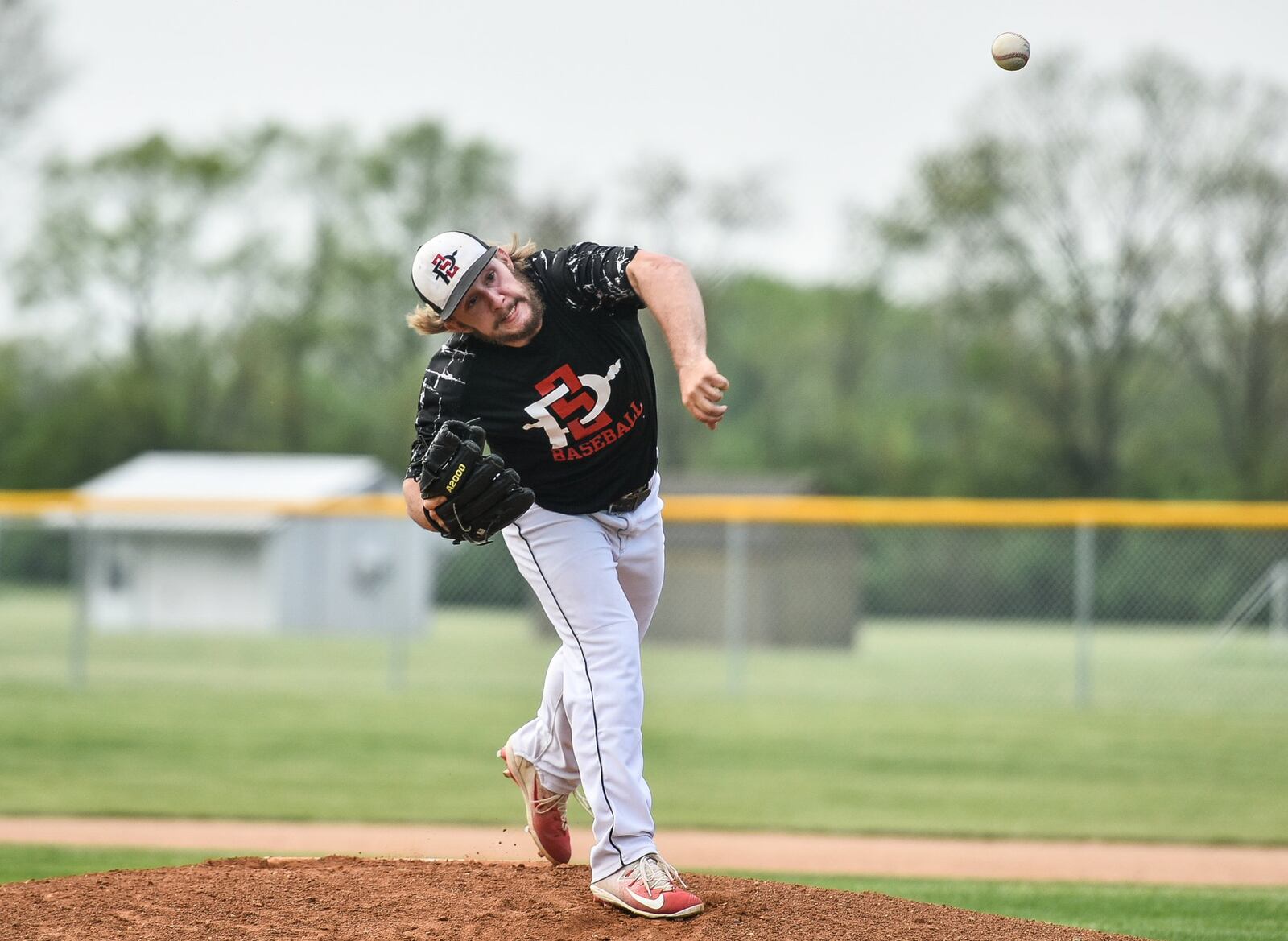 Preble Shawnee’s Eryk Smith delivers a pitch during Wednesday’s Division III sectional game against host Carlisle at Sam Franks Field. NICK GRAHAM/STAFF