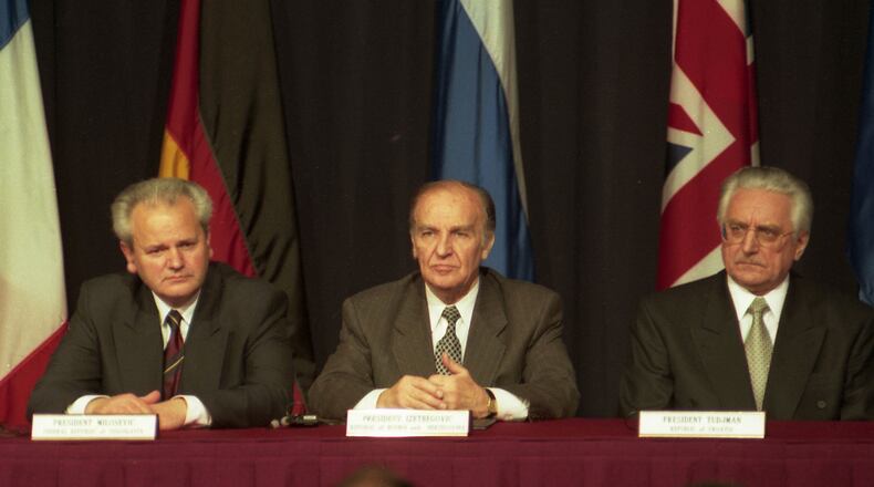 President of the Federal Republic of Yugoslavia Slobodan Milosevic, left, President of Bosnia and Herzegovina Alija Izetbegovic and President of Croatia Franjo Tudman at the signing of the Dayton Agreement of the Bosnia Peace Accord in Fairborn on Nov. 212, 1995. Skip Peterson/Dayton Daily News