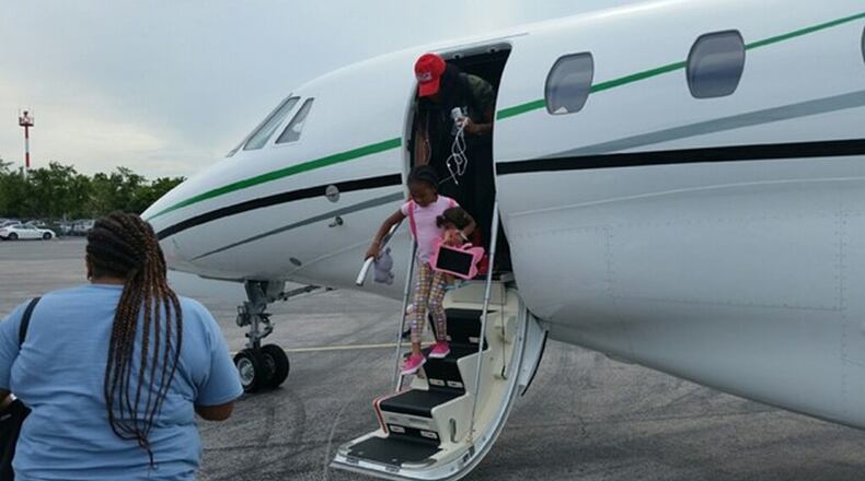 Evacuees set foot on the U.S. mainland after being rescued from hurricane-devastated Puerto Rico on Wednesday. CONTRIBUTED