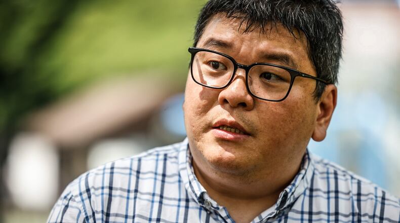 The University of Dayton assistant professor, Chia-Yu Wu talks about a new research project about river flooding and how flooding affects certain demographics in the Dayton area. JIM NOELKER/STAFF