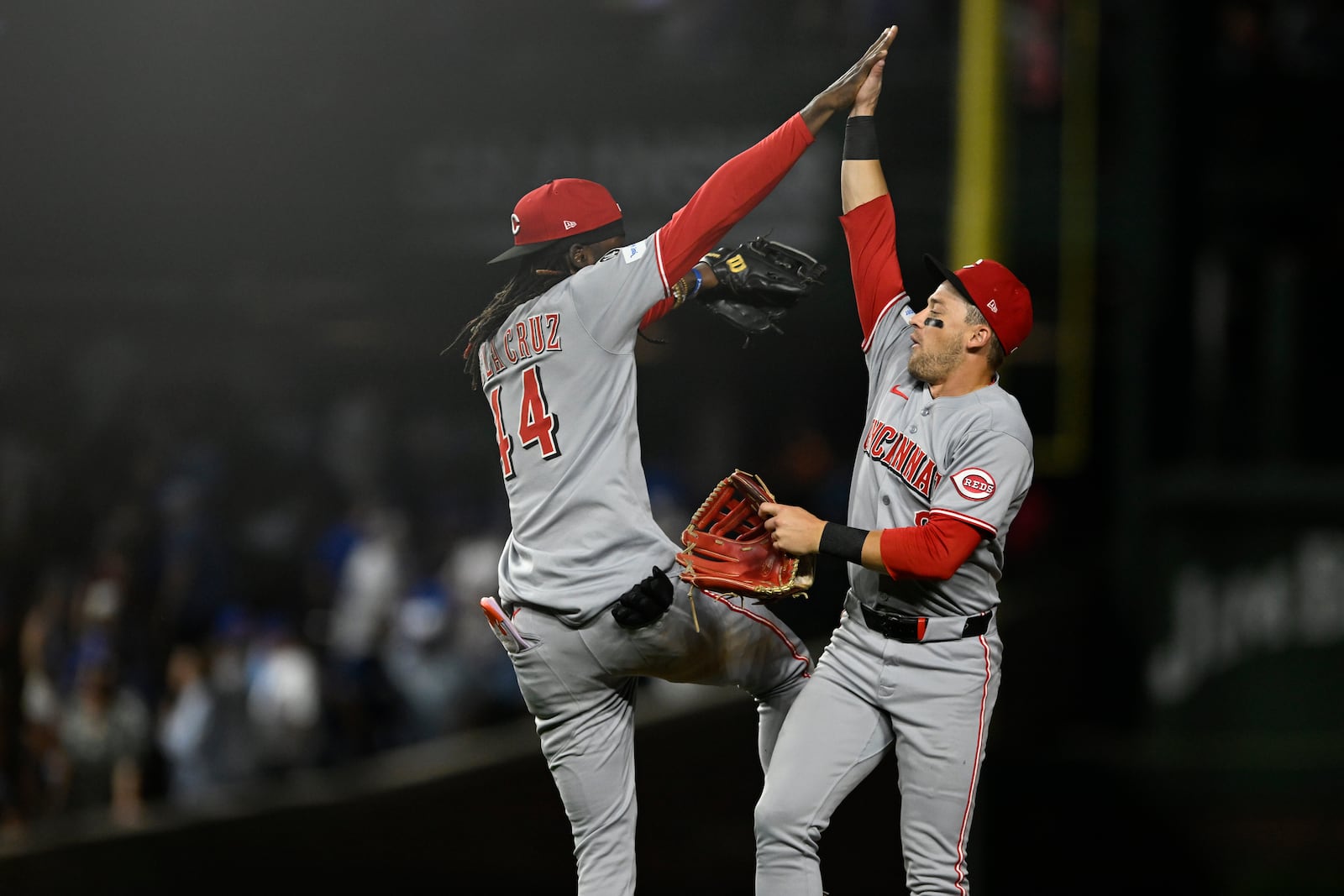 Cincinnati Reds' Elly De La Cruz, left, celebrates with teammate TJ Friedl, right, after defeating the Chicago Cubs in a baseball game Monday, Aug. 4, 2025, in Chicago. (AP Photo/Paul Beaty)