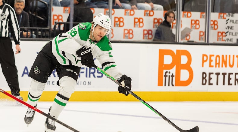 Dallas Stars right wing Mikko Rantanen (96) passes the puck against the Utah Mammoth during the second period of an NHL hockey game Saturday, Jan. 31, 2026, in Salt Lake City. (AP Photo/Melissa Majchrzak)