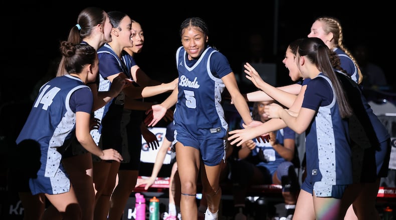 Fairmont senior guard Kaylah Thornton runs out during pregame introductions before the Division I state final on Saturday, March 14 at University of Dayton Arena. BRYANT BILLING / STAFF