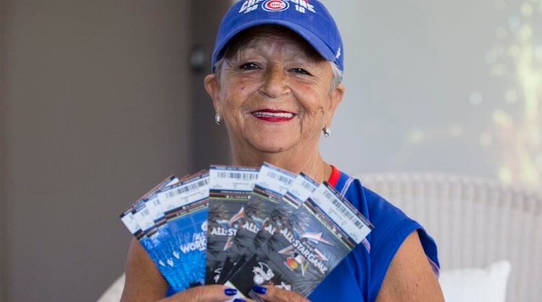 Jean Marie Tidbit Carrino, 62, holds her tickets to the 88th Major League Baseball All-Star Game taking place at Marlins Parks on July 11, 2017. Carrino, a Cubs fanatic, will now have attended 54 consecutive MLB All-Star Games since the age of 8. (Matias J. Ocner/Miami Herald/TNS)
