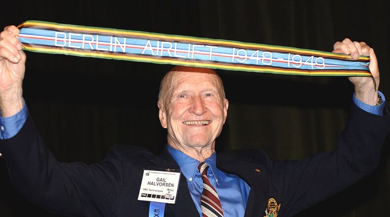 Retired Col. Gail Halvorsen displays the newly authorized Berlin Airlift streamer presented to him Oct. 29 at the Airlift Tanker Association convention. Units that participated in the 1948-1949 humanitarian airlift can include the streamer on their units’ guidons. Halvorsen is known as the “Candy Bomber” for dropping candy from his aircraft to German children during the airlift. (U.S. Air Force photo)