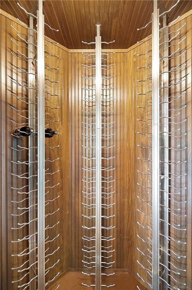 PHOTOS: Spectacular $1.8M luxury home on market with pool, golf simulator