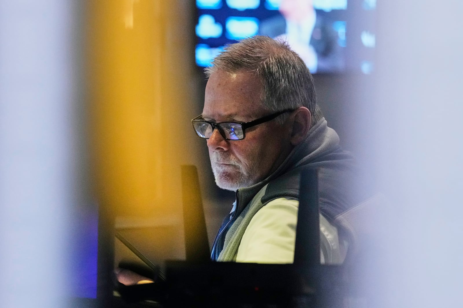 Trader Michael Conlon works on the floor of the New York Stock Exchange, Tuesday, May 20, 2025. (AP Photo/Richard Drew)