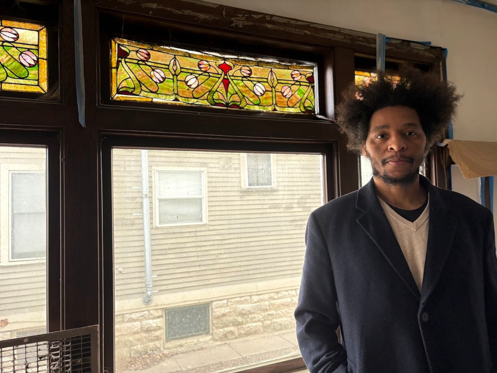 Dayton resident Talib Petaway inside the home he and partners are renovating at 115 Yale Ave. "We are looking to help revitalize the neighborhood," he said. THOMAS GNAU/STAFF