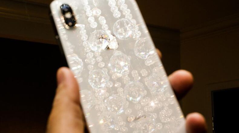 The iPhone X is an overdue and winning evolution of the iPhone, but you ll need to leave your comfort zone to make a jump into the face-recognizing future. (CNET/TNS)