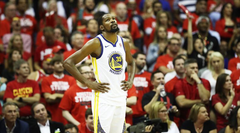 HOUSTON, TX - MAY 24: Kevin Durant #35 of the Golden State Warriors reacts late in the fourth quarter of Game Five of the Western Conference Finals of the 2018 NBA Playoffs against the Houston Rockets at Toyota Center on May 24, 2018 in Houston, Texas. (Photo by Ronald Martinez/Getty Images)