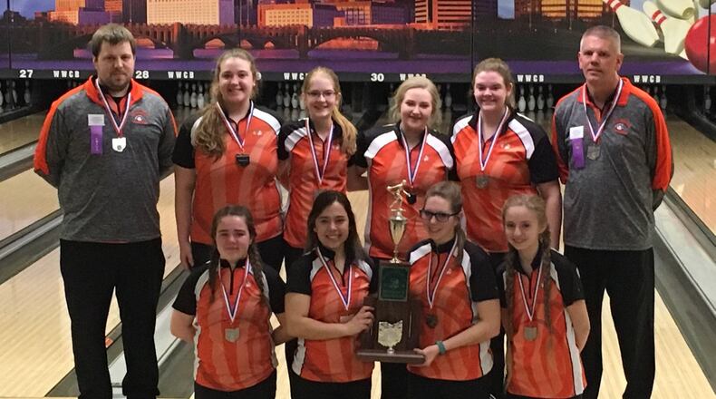 The state runner-up girls bowling team from Coldwater. Front row: Alison Fox, Emily Fortener, Emily Forsthoefel, Sarah Brunswick. Back row: Coach Wes Stienecker, Lauren Wenning, Emily Sudhoff, Rachel Miller, Amanda Melhouse, Coach Rick Hartings. CONTRIBUTED