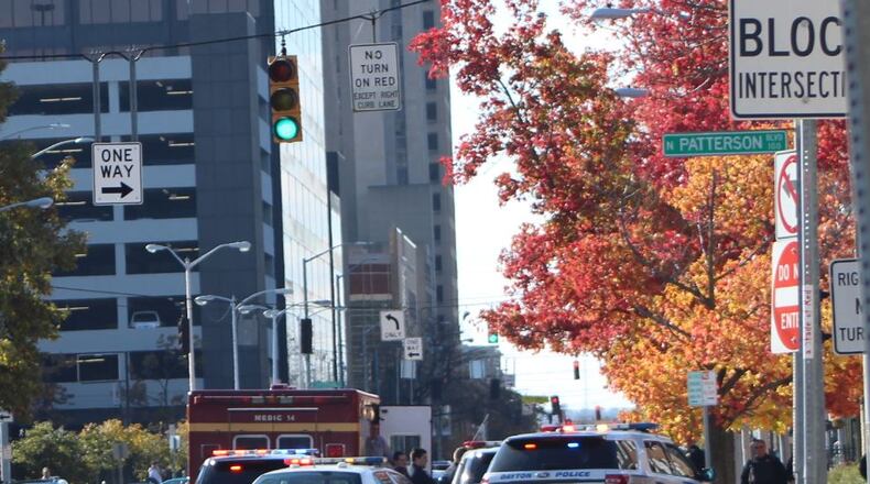 Dayton police and fire respond to an incident on East Second Street. The city plans to spend about $2.7 million of its new Issue 9 money on public safety forces next year. CORNELIUS FROLIK / STAFF