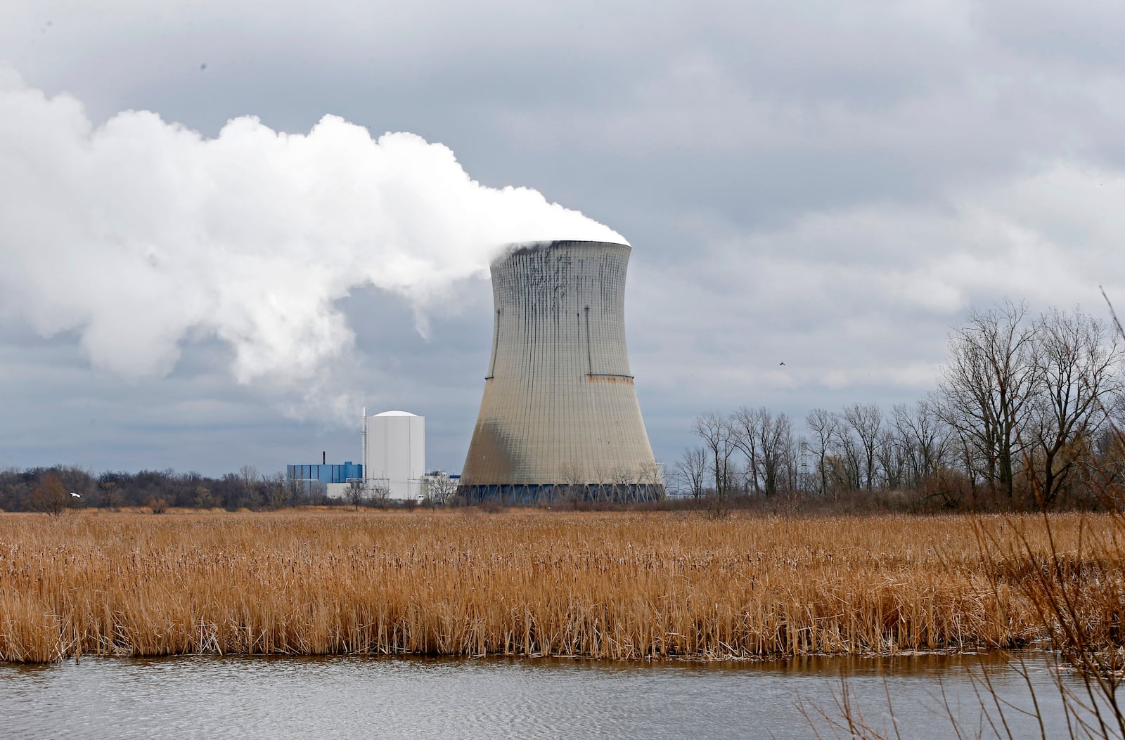 FILE - The then-FirstEnergy Corp.'s Davis-Besse Nuclear Power Station in Oak Harbor, Ohio, is pictured on April 4, 2017. (AP Photo/Ron Schwane, File)