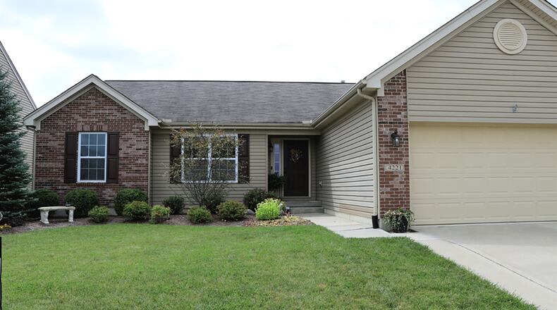 The vinyl-sided ranch home has about 1,570 sq. ft. of living space, plus the basement. The property includes 3 bedrooms and an oversized, 2-car garage. CONTRIBUTED PHOTO BY KATHY TYLER
