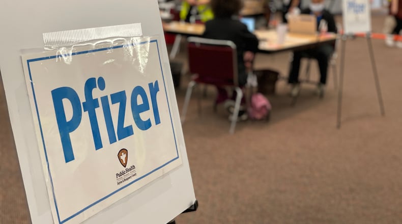 Public Health - Dayton & Montgomery County has been administering Pfizer vaccine boosters. Vaccinations and boosters are attributed as part of why this surge did not hit nursing homes as hard as last year. FILE
