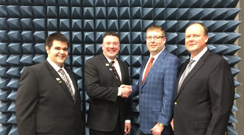 Max McConnell (left) and Paul Newman Jr. (center-left) of Greene County Development met with Resonant Sciences President J. Micah North (center-right) and Vice President Ron Miller (right) in Resonant’s Antenna & Radome Measurement Chamber.
