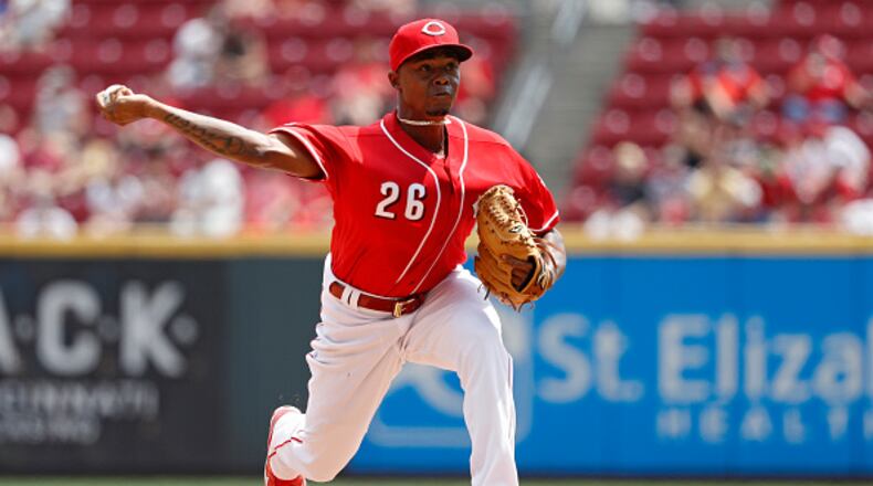 CINCINNATI, OH - AUGUST 04: Raisel Iglesias #26 of the Cincinnati Reds pitches in the seventh inning against the St. Louis Cardinals at Great American Ball Park on August 4, 2016 in Cincinnati, Ohio. The Reds defeated the Cardinals 7-0. (Photo by Joe Robbins/Getty Images)