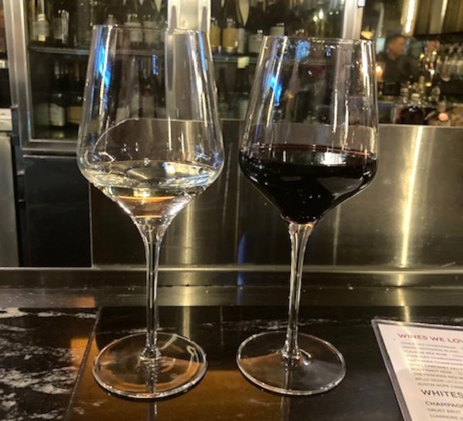 White and red wine at J. Alexander's in Dayton. RAY MARCANO/CONTRIBUTED