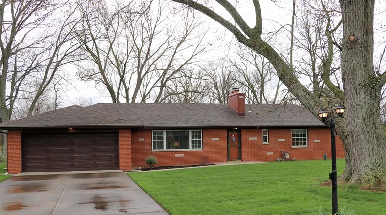 Listed for $310,000, the residence at 906 Grove Hill Drive in Beavercreek has about 1,840 square feet of living space. CONTRIBUTED PHOTOS/KATHY TYLER