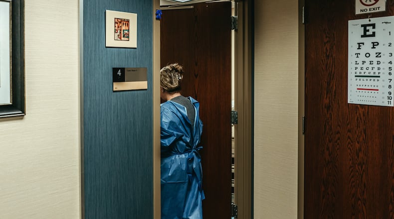 AP FILE - A health care worker at the Park Nicollet Gender Services Clinic that provides medical treatment including puberty blockers in Minneapolis, June 6, 2023. Laws in more than 20 states have left the fate of clinics in doubt and families with transgender children searching for medical care across state lines. (Jamie Kelter Davis/The New York Times)