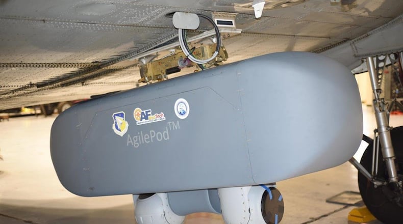 The AgilePod, the first physical system to be trademarked by the Air Force, is a multi-intelligence, open architecture, flight-line reconfigurable pod designed for the intelligence community. A new effort to develop a suite of platform-agnostic AgilePods in various sizes is currently in progress, teaming AFRL with industry partners. (U.S. Air Force photo/David Dixon)