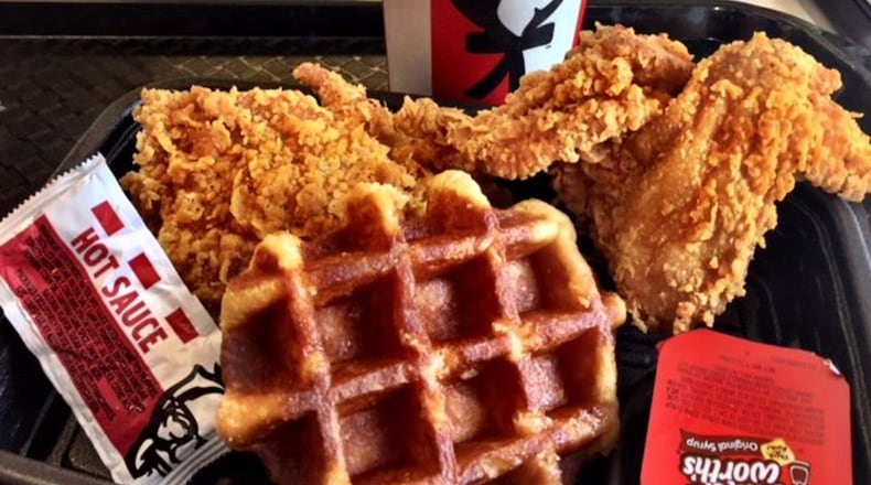 KFC’s new chicken and waffle comes with a small, thick, Belgian-style waffle, two pieces of chicken and syrup. (Kathleen Purvis/Charlotte Observer/TNS)