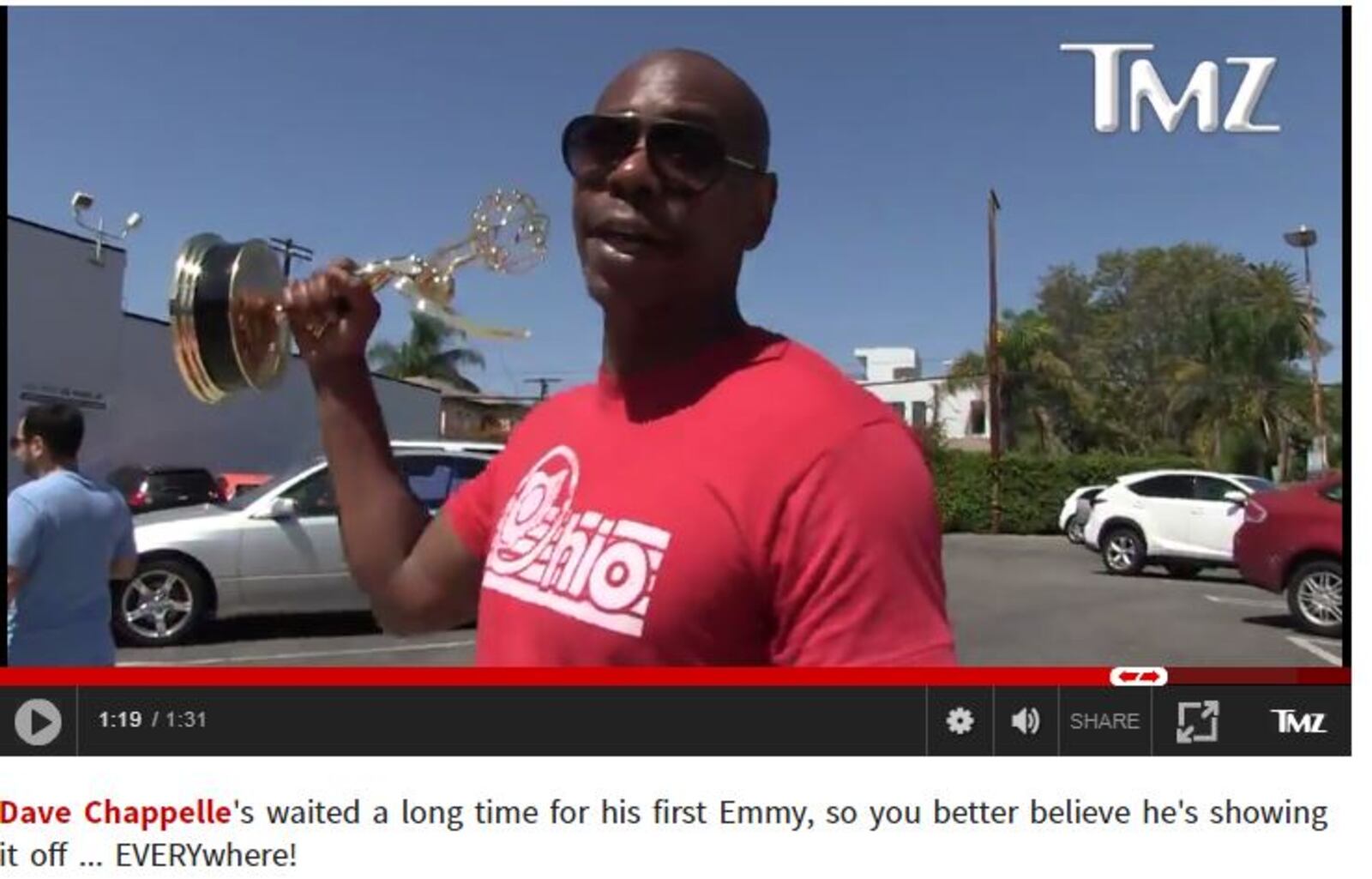 The website TMZ filmed a video of Yellow Springs based comedian David Chappelle walking around West Hollywood with his new Emmy.  Screen grab of TMZ video