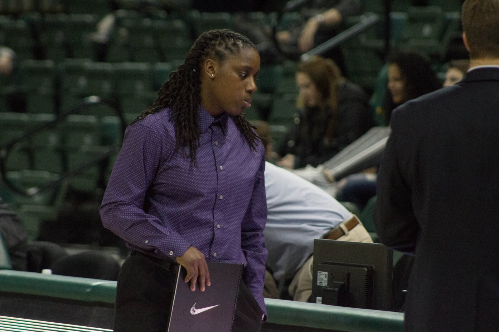 Kim Demmings on the sideline during Wright State’s game Friday nights vs. UIC at the Nutter Center. Allison Rodriguez/CONTRIBUTED