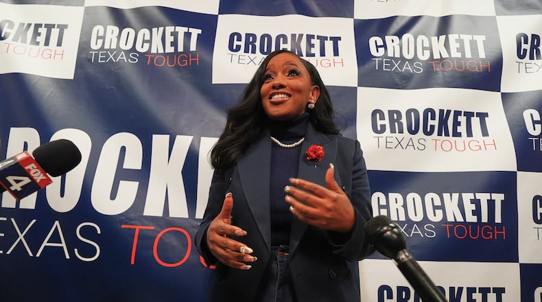 Rep. Jasmine Crockett, D-Texas, speaks to reporters after announcing her run in the Democratic primary for U.S. Senate, Monday, Dec. 8, 2025, in Dallas. (AP Photo/LM Otero)