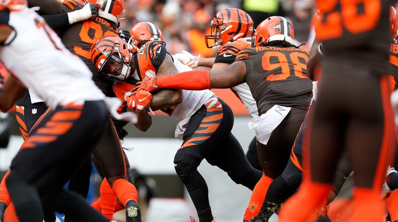 CLEVELAND, OH - DECEMBER 8: Joe Mixon #28 of the Cincinnati Bengals scores a touchdown during the second quarter of the game against the Cleveland Browns at FirstEnergy Stadium on December 8, 2019 in Cleveland, Ohio. (Photo by Kirk Irwin/Getty Images)