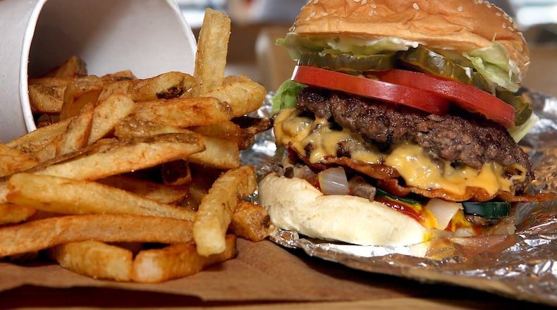 The Hamburger and fries at Five Guys. Staff file photo by Greg Lynch