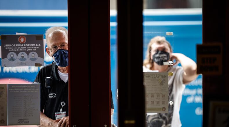 The City of Dayton is requiring all people who enter city owned buildings to wear a masks because of COVID-19. JIM NOELKER/STAFF