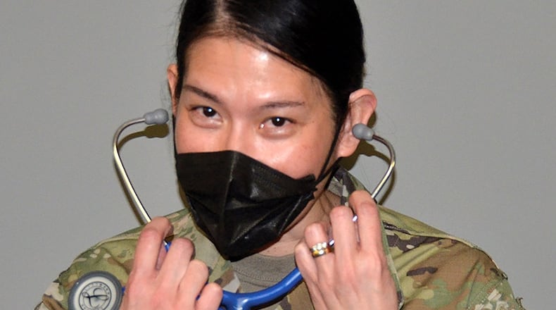 First Lt. Herodina “Dina” Lu discusses her new role as a physician’s assistant at the 445th Airlift Wing. Lu was commissioned in December and is the newest officer in the 445th Aerospace Medicine Squadron. U.S. AIR FORCE PHOTO/CAPT. WILSON WISE