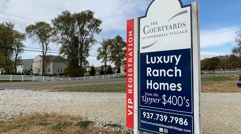 The Courtyards at Stonehill Village has begun construction on Trebein Road, the latest in a series of housing developments in Beavercreek Twp. LONDON BISHOP/STAFF