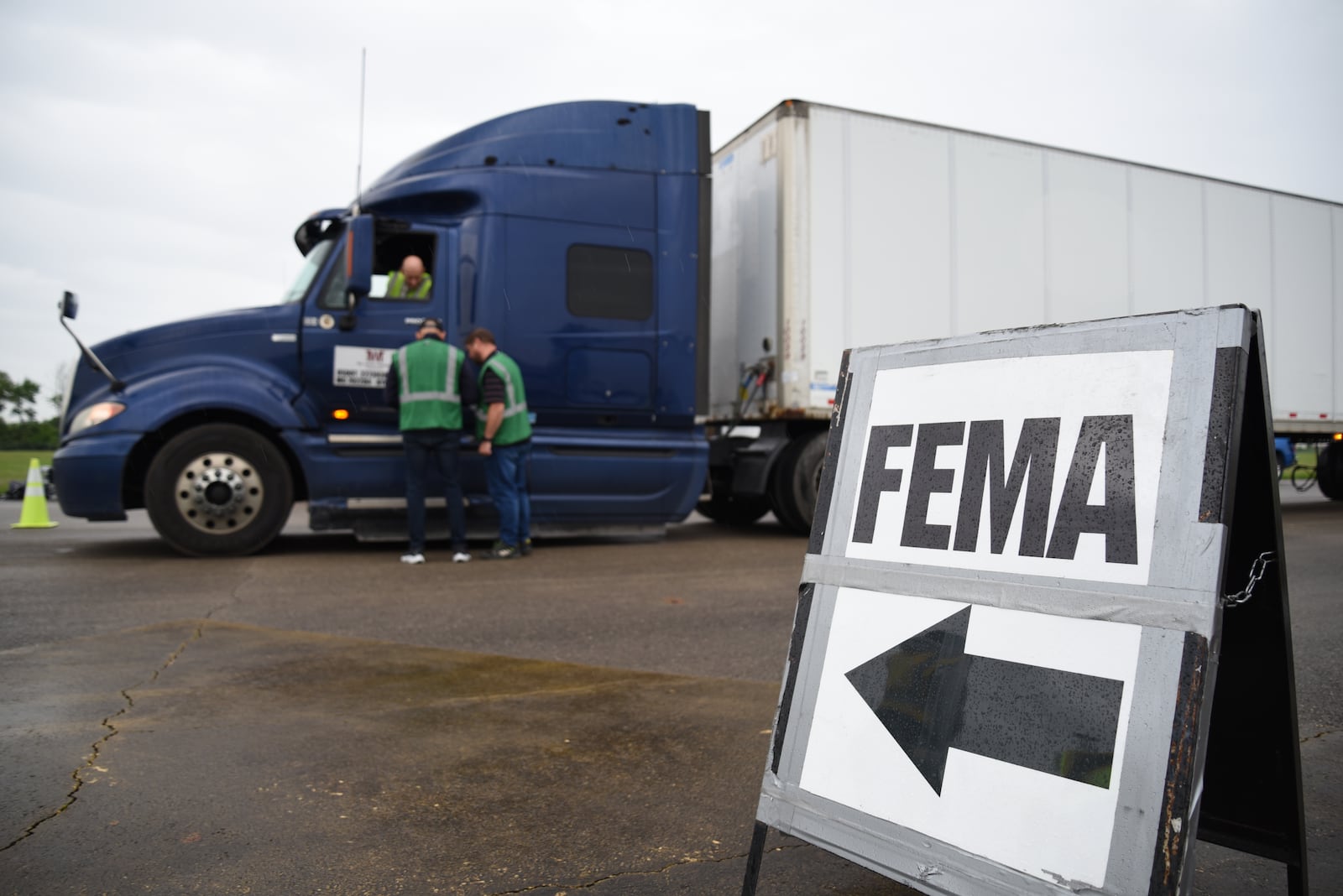 Federal Emergency Management Agency personnel participate in Eagle Rising on May 18 at Wright-Patterson Air Force Base. The national-level field exercise provides training for individuals and communities to better prepare for disasters. About 90 officials responded to a simulated flood disaster in Dayton and had semitrucks deliver essential supplies such as water, food and fuel to the local community. U.S. Air Force photo/Matthew Clouse