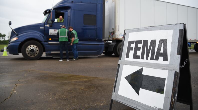 Federal Emergency Management Agency personnel participate in Eagle Rising on May 18 at Wright-Patterson Air Force Base. The national-level field exercise provides training for individuals and communities to better prepare for disasters. About 90 officials responded to a simulated flood disaster in Dayton and had semitrucks deliver essential supplies such as water, food and fuel to the local community. U.S. Air Force photo/Matthew Clouse