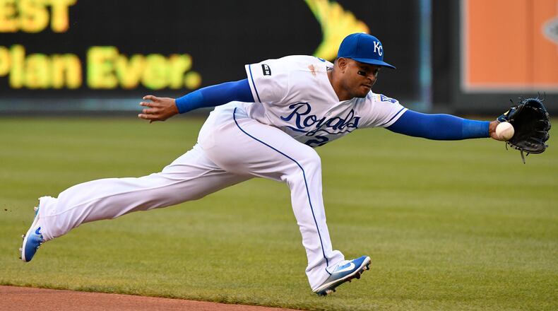 KANSAS CITY, MO - MAY 2: Christian Colon #24 of the Kansas City Royals reaches out but canât stop a ball hit by Yolmer Sanchez #5 of the Chicago White Sox in the first inning at Kauffman Stadium on May 2, 2017 in Kansas City, Missouri. (Photo by Ed Zurga/Getty Images)