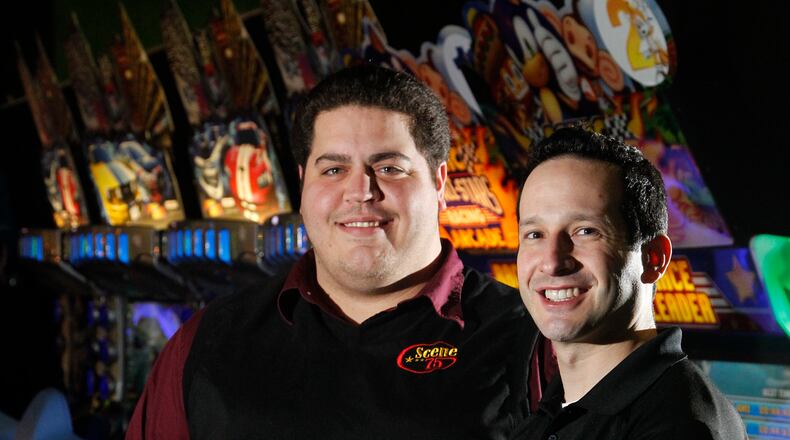 Stevie Baia, general manager, left, and Jonah Sandler, chief executive of Scene75 Entertainment Center, in a 2014 photo. LISA POWELL / STAFF