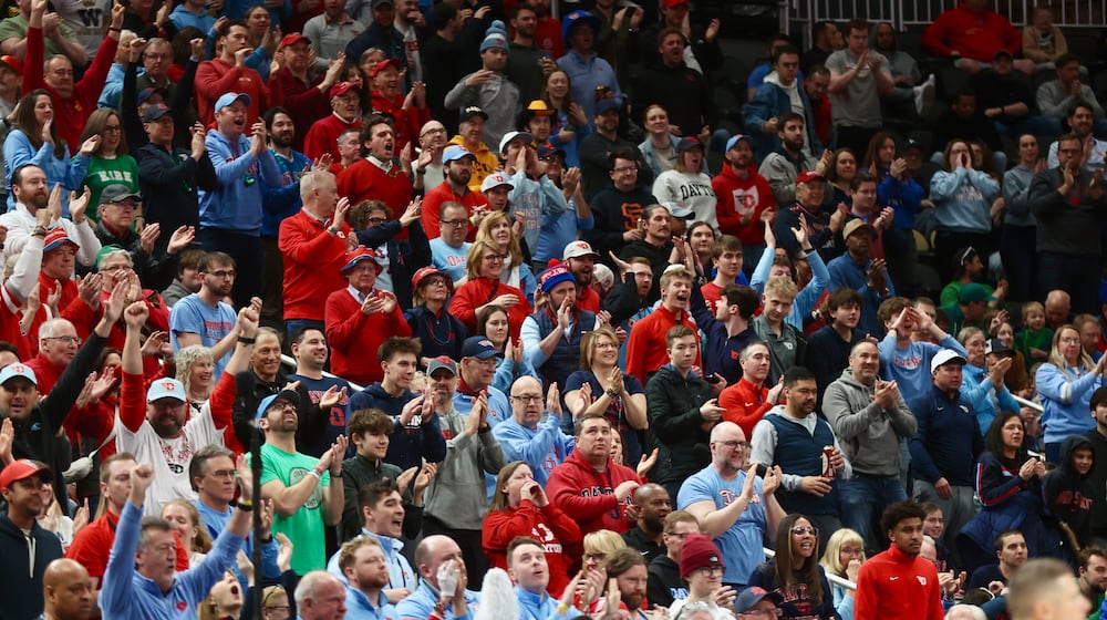 Dayton fans cheer during a game against Saint Louis in the semifinals of the Atlantic 10 Conference tournament on Saturday, March 14, 2026, at PPG Paints Arena in Pittsburgh. David Jablonski/Staff