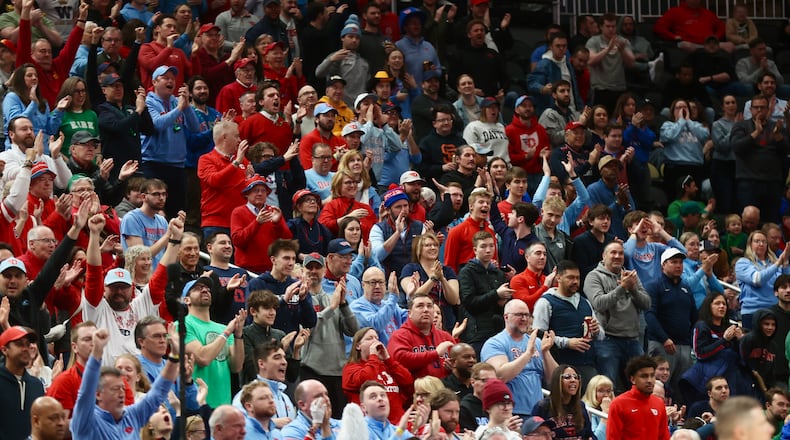 Dayton fans cheer during a game against Saint Louis in the semifinals of the Atlantic 10 Conference tournament on Saturday, March 14, 2026, at PPG Paints Arena in Pittsburgh. David Jablonski/Staff