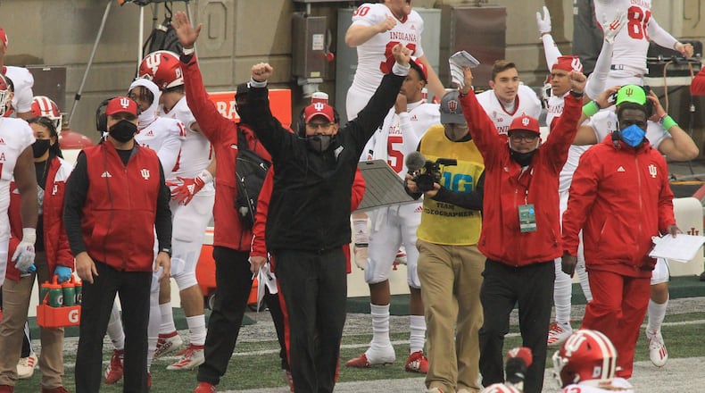 Indiana coaches celebrate a defensive stop against Ohio State in the fourth quarter on Saturday, Nov. 22, 2020, at Ohio Stadium in Columbus. David Jablonski/Staff
