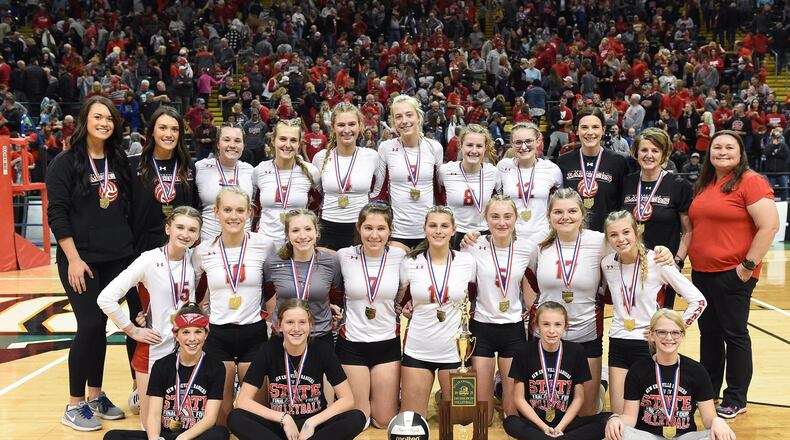New Knoxville won its first state volleyball championship Saturday, knocking off Midwest Athletic Conference rival St. Henry in the Division IV title game at the Nutter Center. OHSAA photo
