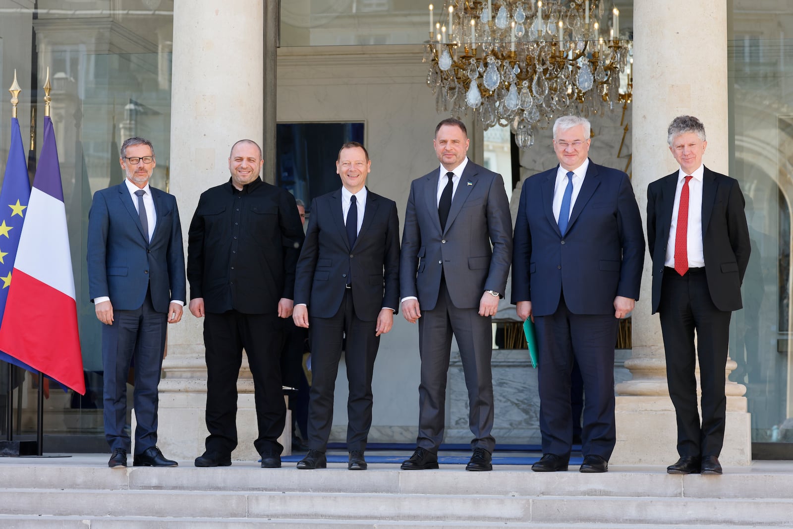 From left to right, Germany national security advisor Jens Plotner, Ukraine's Defence Minister Rustem Umerov, French President diplomatic advisor Emmanuel Bonne, Ukraine's President chief of staff Andriy Yermak, Ukraine's Foreign Minister Andriy Sybiga, and Britain's National Security Adviser Jonathan Powell pose as they arrive for a meeting with French President Emmanuel Macron at the Elysee Palace in Paris, Thursday, April 17, 2025. (Ludovic Marin, Pool Photo via AP)