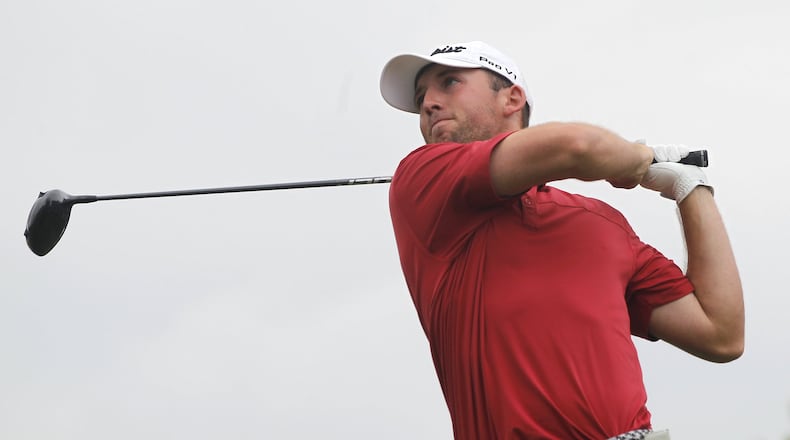 Eventual winner Austin Sipe tees off at the Ohio Amateur at the Springfield Country Club earlier this month. BILL LACKEY / STAFF
